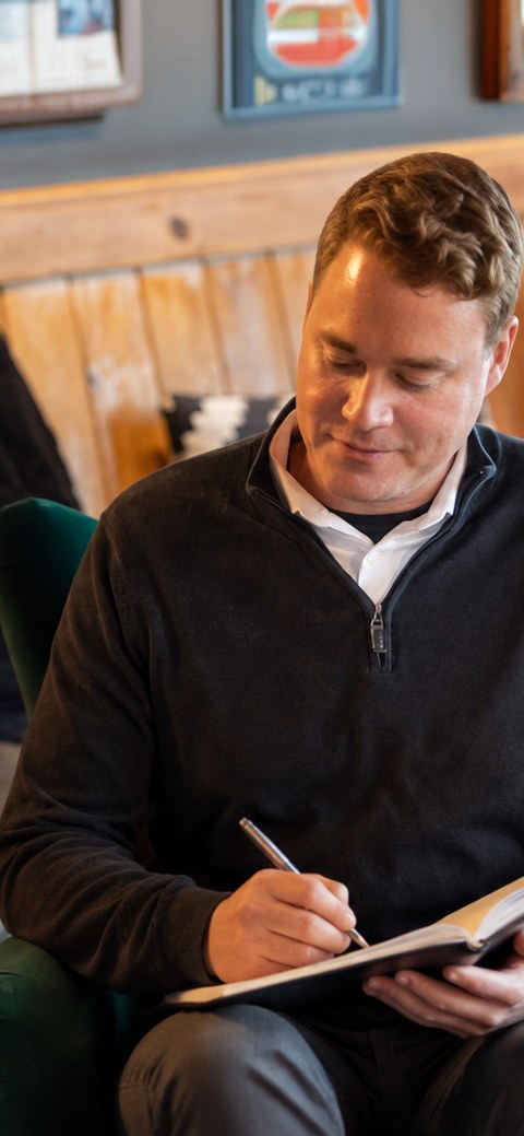 Business owner reviewing a manufacturing valuation