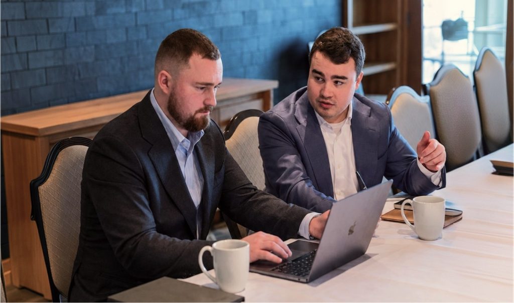 Advisors discussing the M&A timeline