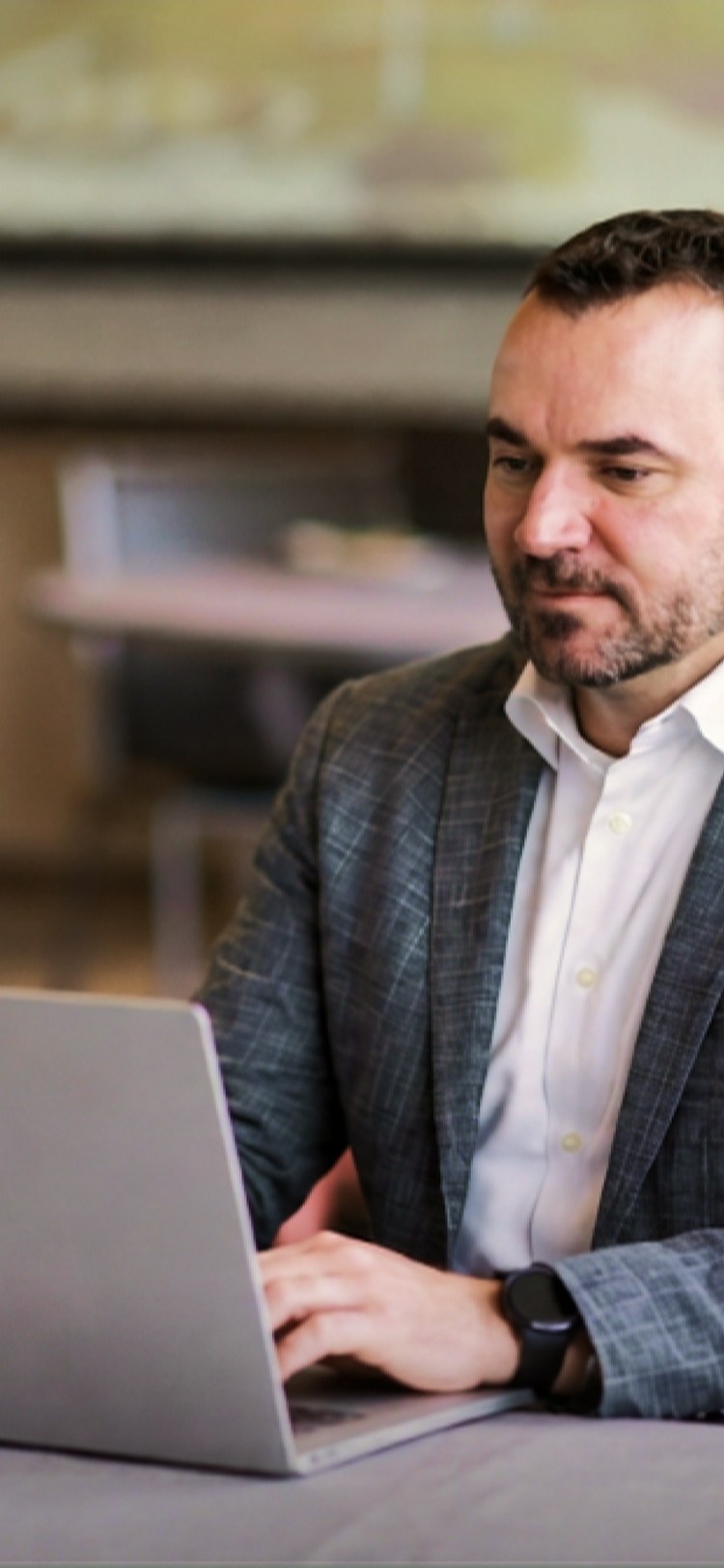 Business owner working on a laptop
